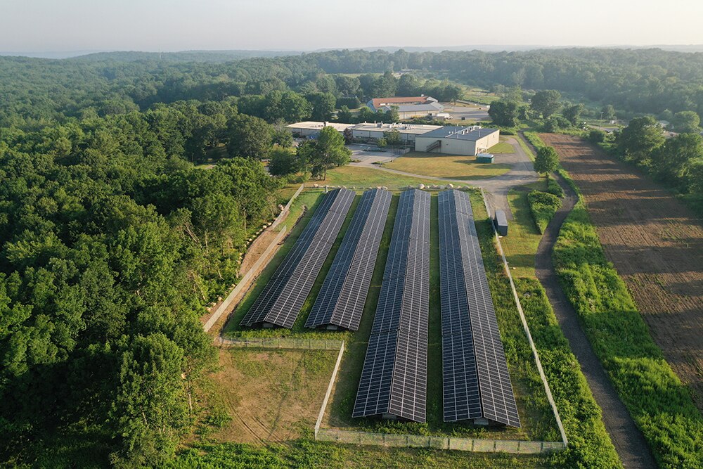 Aerial view of large solar farm facilities