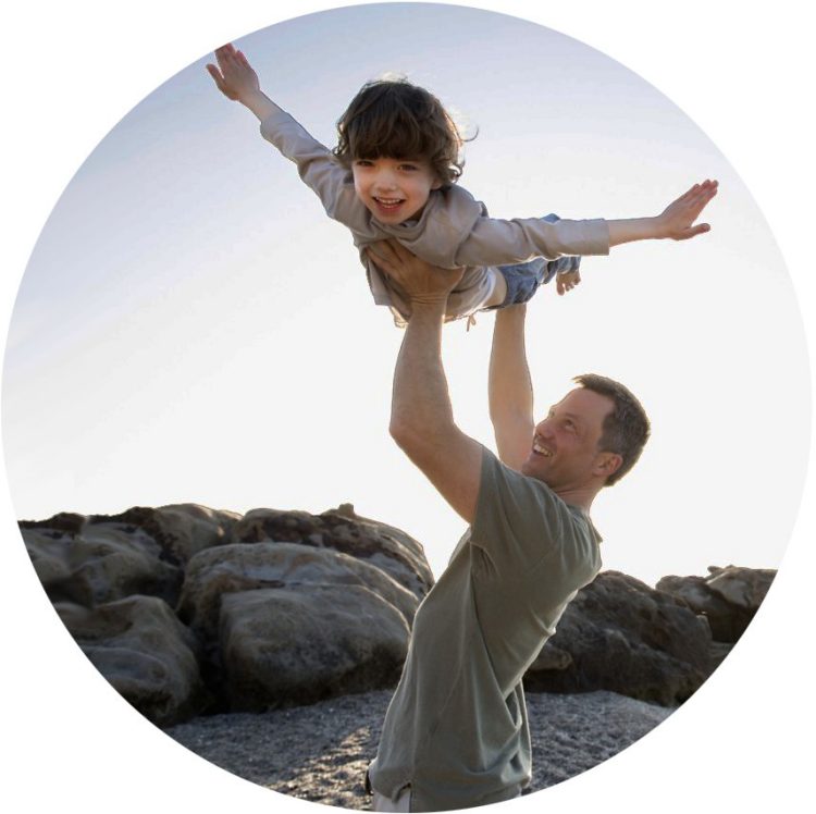 Man lifts son