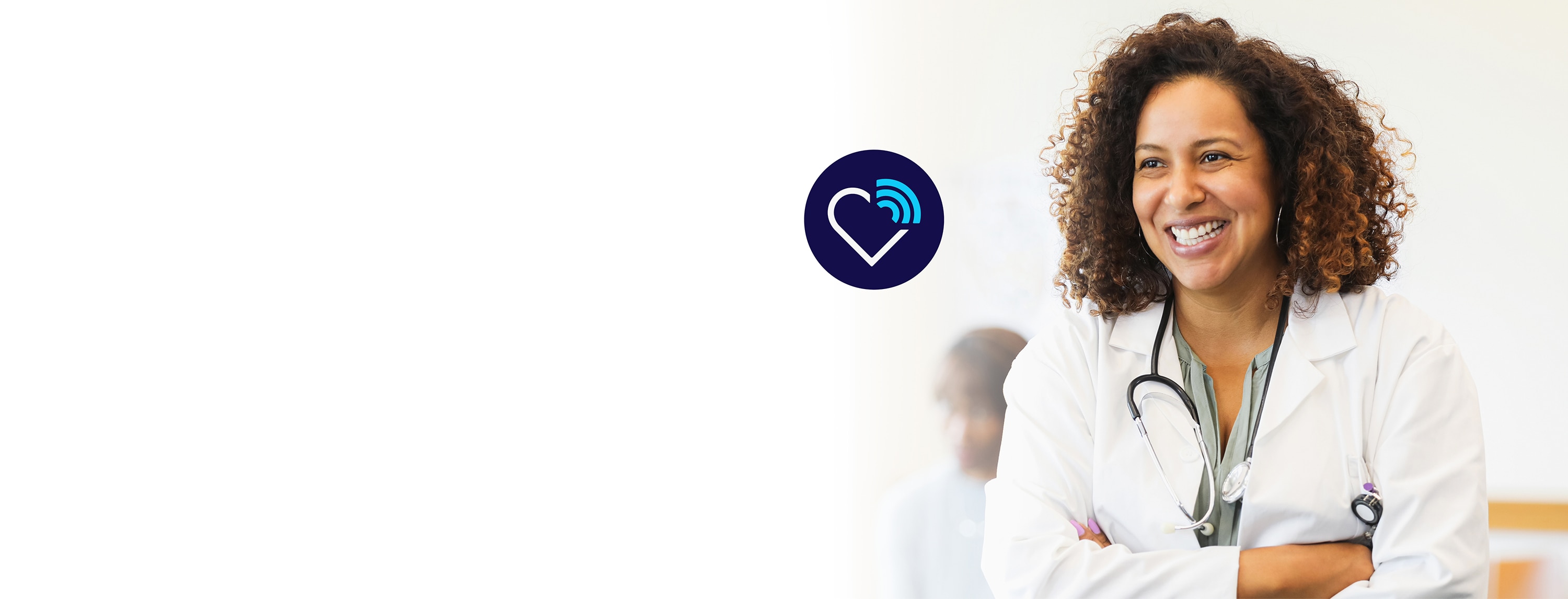 Encircled heart icon with network connection floating next to female doctor in a white lab coat and a stethoscope
