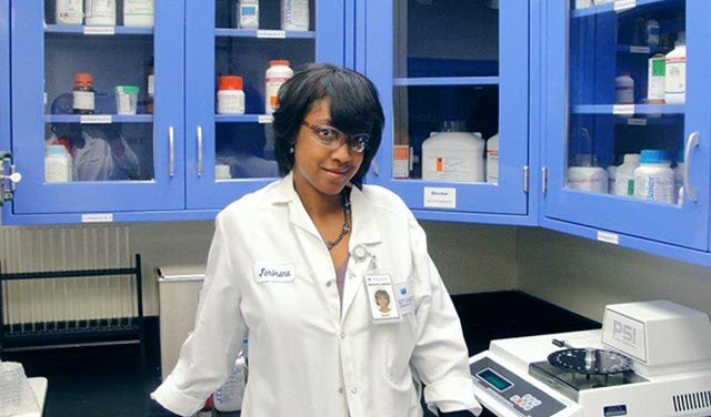 Bre Jacobs, Senior Program Manager, Research, in a laboratory