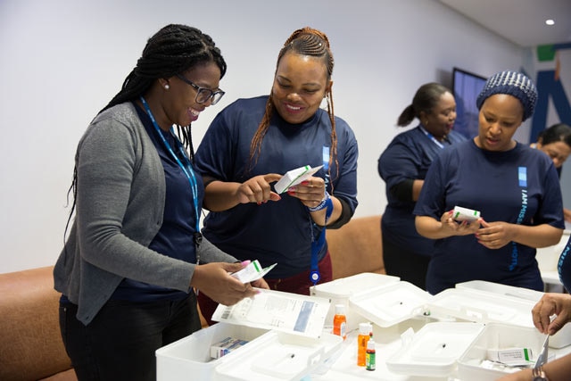 Medtronic employees pack supplies.