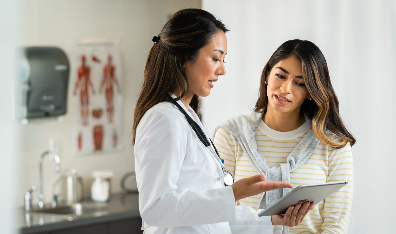 Healthcare professional talking to a patient