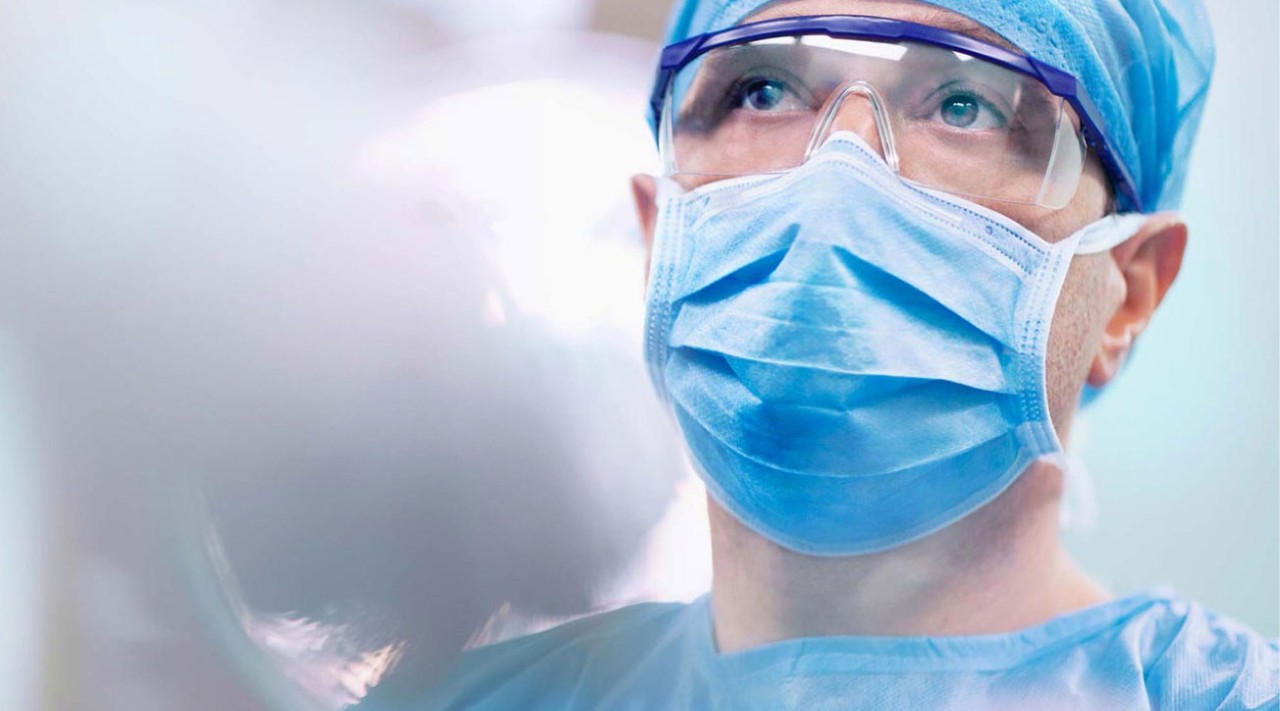 Surgeon with mask in OR
